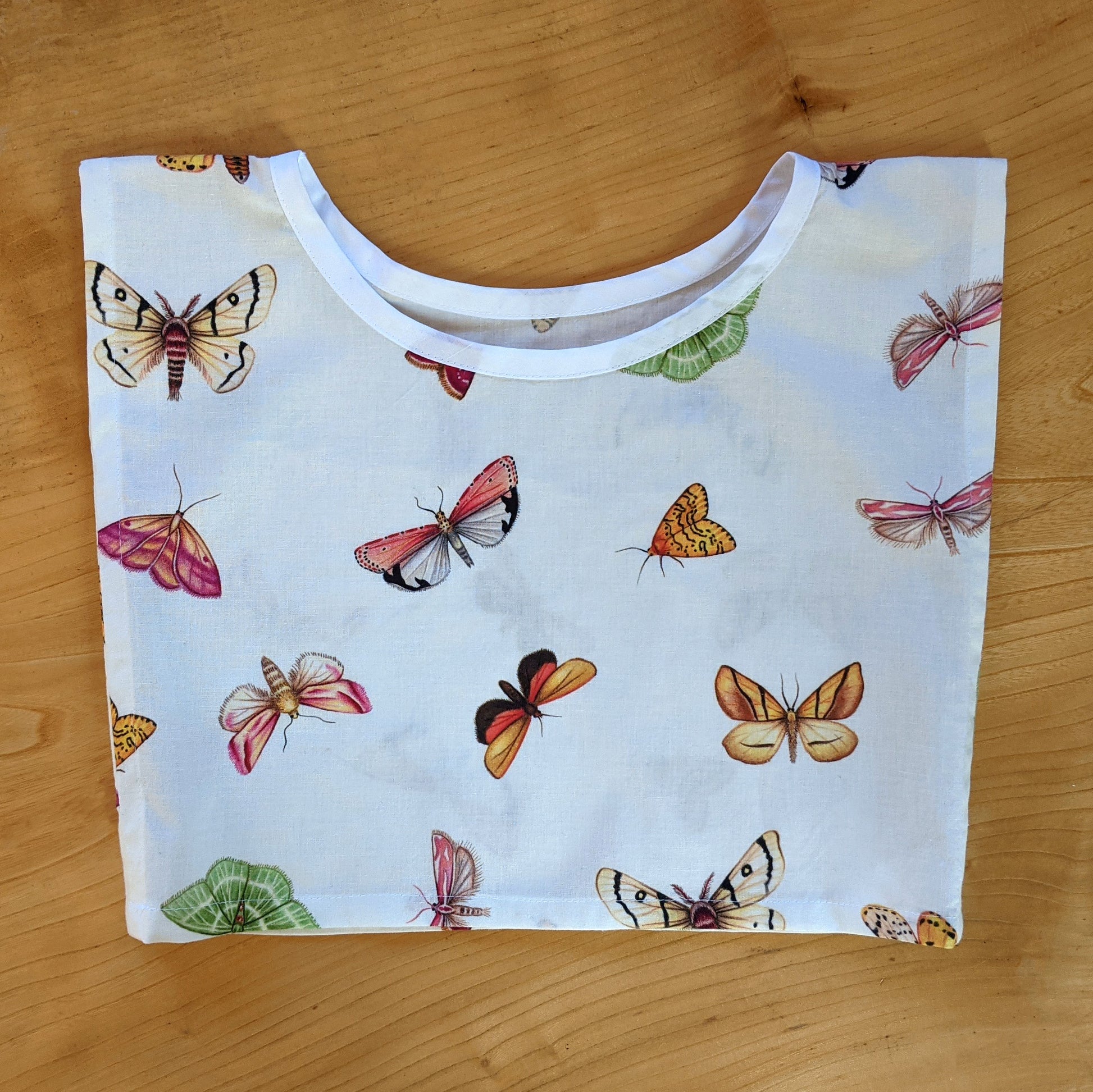 Girls patterned blouse. Moth print